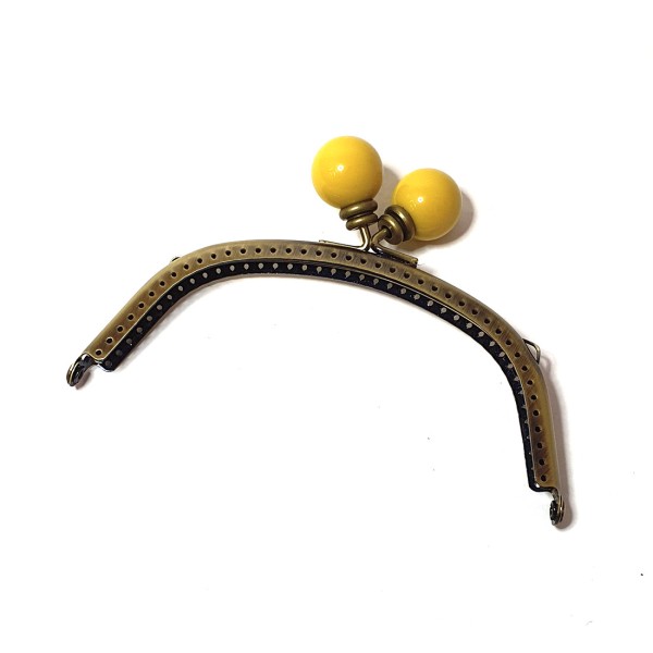 Boquilla con perla amarilla